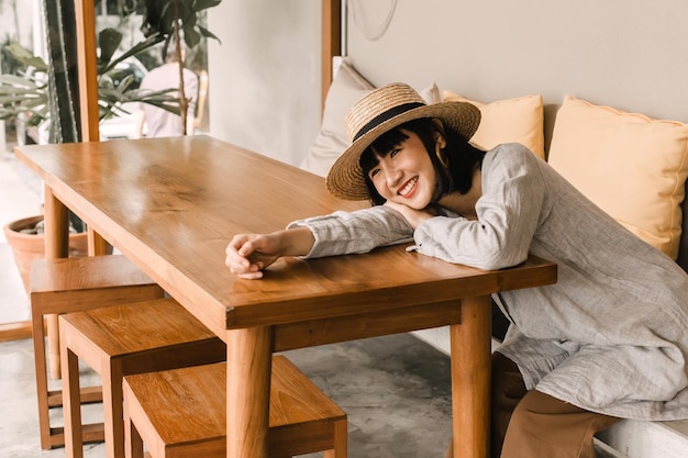 Happy woman sit on couch