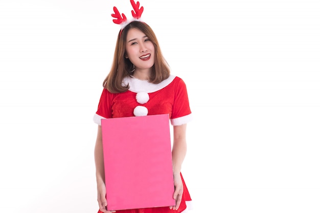 Happy woman wearing santa claus dress