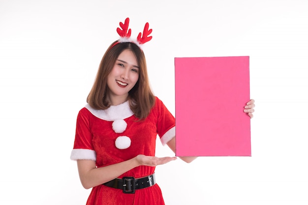 Happy woman wearing santa claus dress