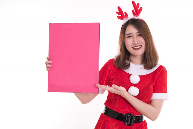 Happy woman wearing santa claus dress