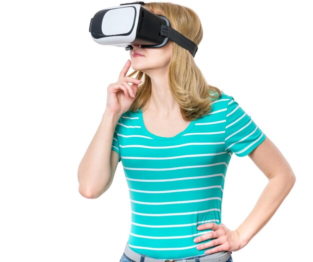 Photo happy woman wearing virtual reality goggles watching movies or playing video games closeup smiling female looking in vr glasses isolated on white background