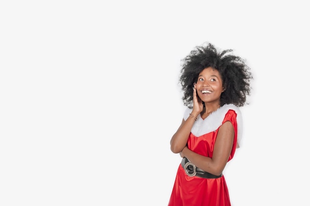 Happy young black woman in a christmas costume