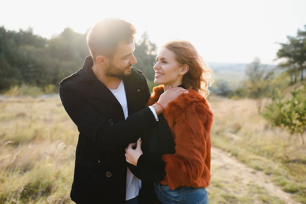 Happy young couple in love at the park