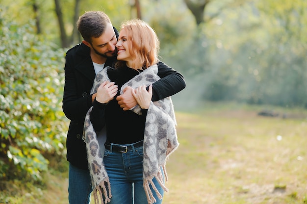 Happy young couple in love at the park