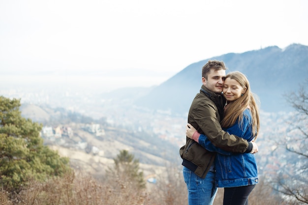 Happy young couple on mountains