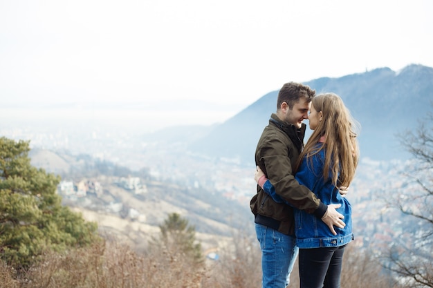 Happy young couple on mountains