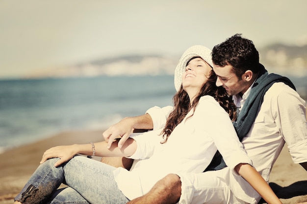 happy young couple in white clothing  have romantic recreation and   fun at beautiful beach on  vacations