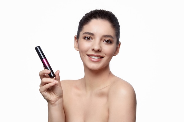 Happy young female against a white background