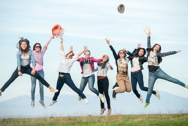 Happy young friends at nature