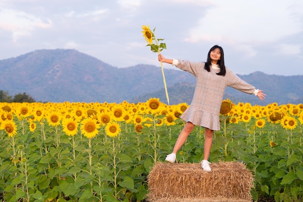 Happy young girl with flower