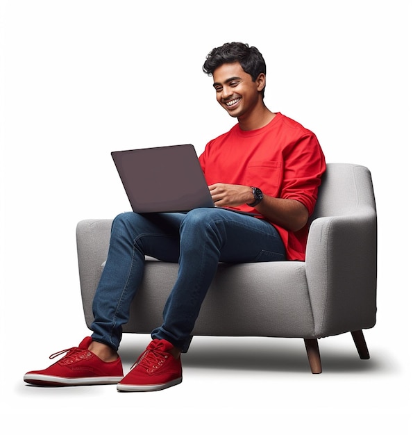 Happy young indian male working on a laptop sitting Photo AI generated