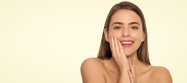 Happy young lady touch perfect face skin isolated on white background skin Woman beauty face close up portrait isolated banner with copy space