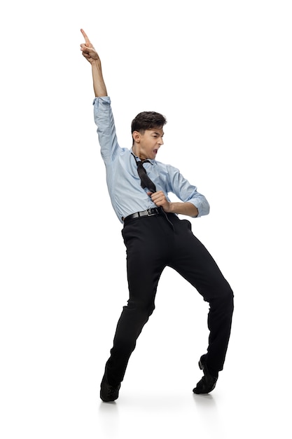 Happy young man dancing in casual clothes or suit, remaking legendary moves of celebrity