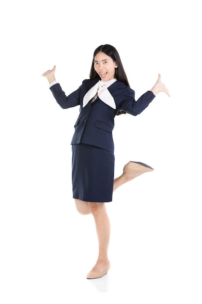 Happy young woman in formal wear and expressing positive.