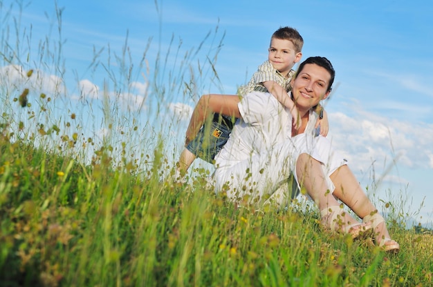 happy young woman mother play and outdoor with beautiful child