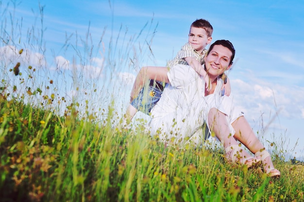 happy young woman mother play and outdoor with beautiful child