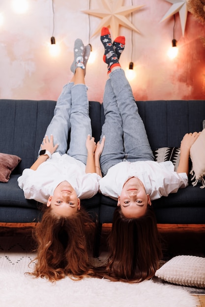 Happy young women wearing in white shirts and jeans celebration women's day