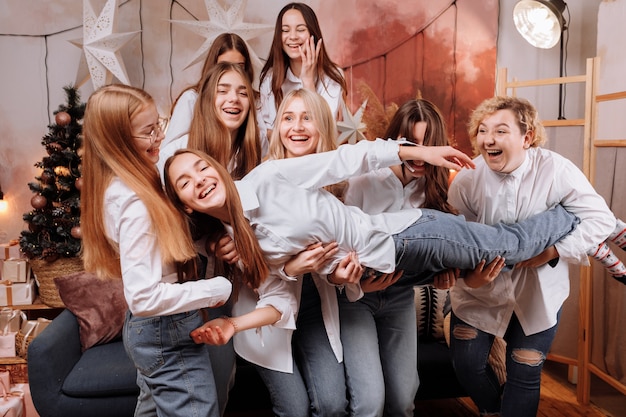 Happy young women wearing in white shirts and jeans celebration women's day