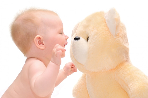 Hapy baby with teddy bear