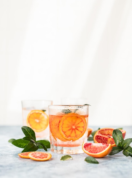 Hard seltzer cocktail with blood orange Cocktail or lemonade with fresh citrus low alcohol mocktail