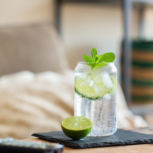 Hard seltzer cocktail with lime for relaxing afternoon at home