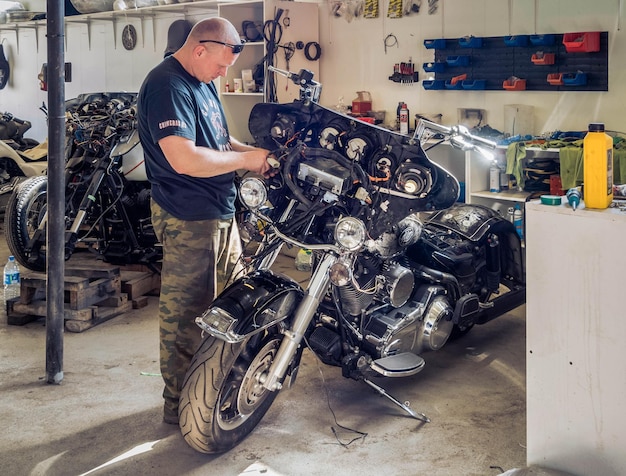 Harley Davidson motorcycles in a motorcycle workshop on the outskirts