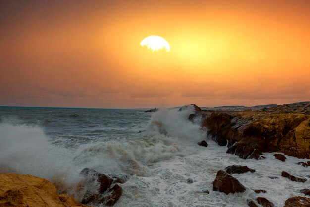 Harsh waves hitting the rocks