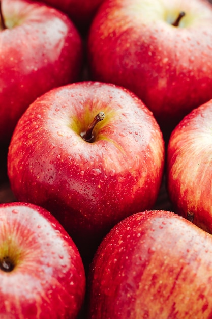 Harvest of ripe apples variety Red Delicious Food background macro photography