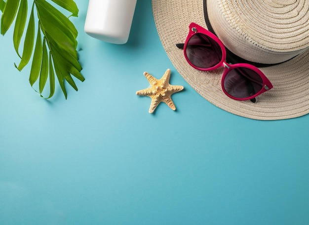 A hat, sunglasses, and a starfish are on a blue background.