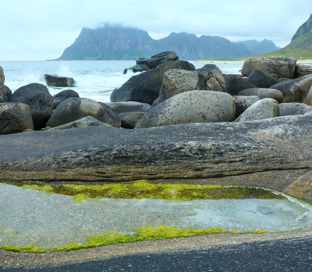 Haukland stony beach summer view (Norway, Lofoten).