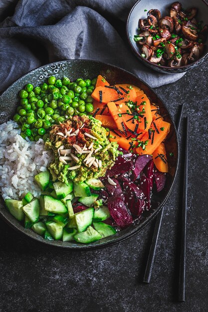 Hawaiian poke bowl with avocado, sesame and cucumber