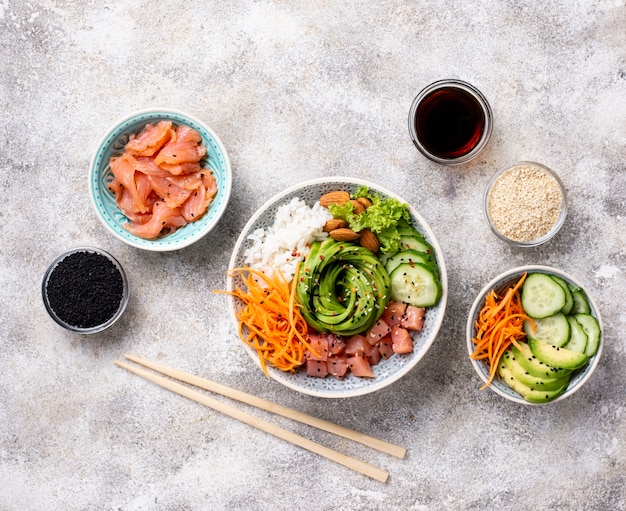 Hawaiian poke bowl with salmon, rice and vegetable