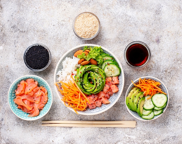 Hawaiian poke bowl with salmon, rice and vegetable