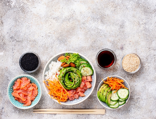 Hawaiian poke bowl with salmon, rice and vegetable