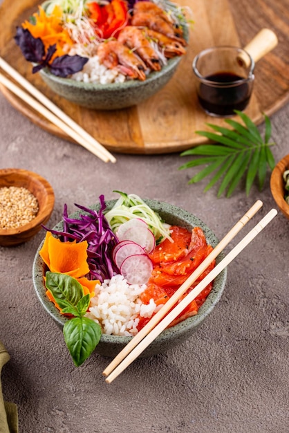 Hawaiian poke bowl with salmon and shrimps