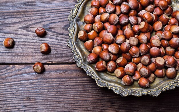 Hazelnuts on an iron plate