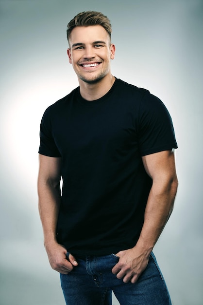 He just broke the handsome metre Studio shot of a handsome young man posing against a grey background