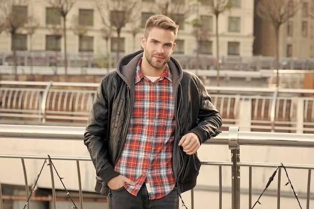 He likes autumn Caucasian man on autumn day Handsome guy wear fashion autumn style Comfortable autumn outfit Urban lifestyle Trendy fall wardrobe for men