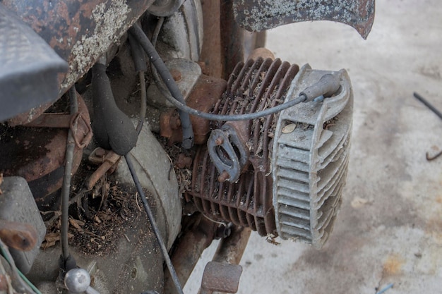 The head of an old retro bike with an opposing engine rusty metal on a motorcycle