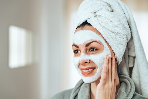 Head shot of a beautiful woman with face mask.