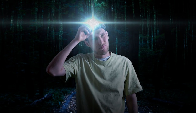 A head torch light lamp on the person, exploration and adventure activity outdoor