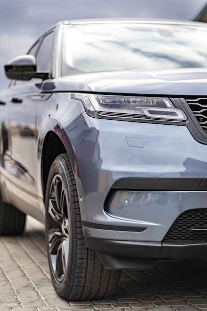 Headlight front of modern prestigious car closeup