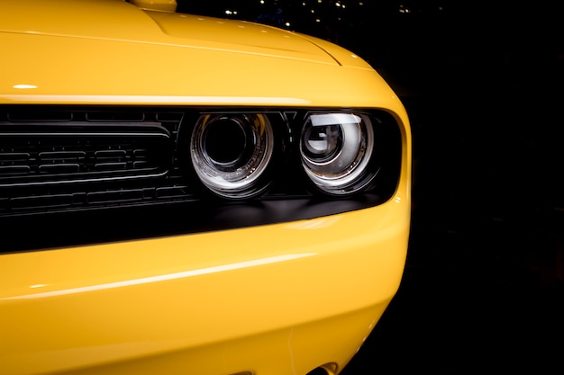 Headlight yellow muscle car - front view