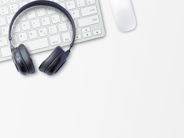 Headphone and keyboard on office desk