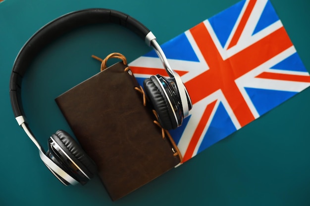 Headphones and flag The study of foreign subjects Audiobooks in a foreign language Language classes Listening