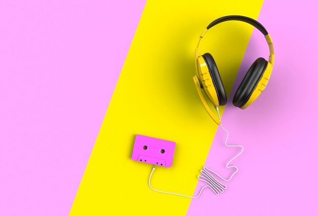 Photo headphones with pink cassette tape on pink and yellow background,