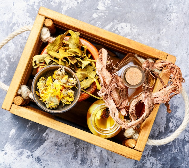 Healing herbs in wooden box