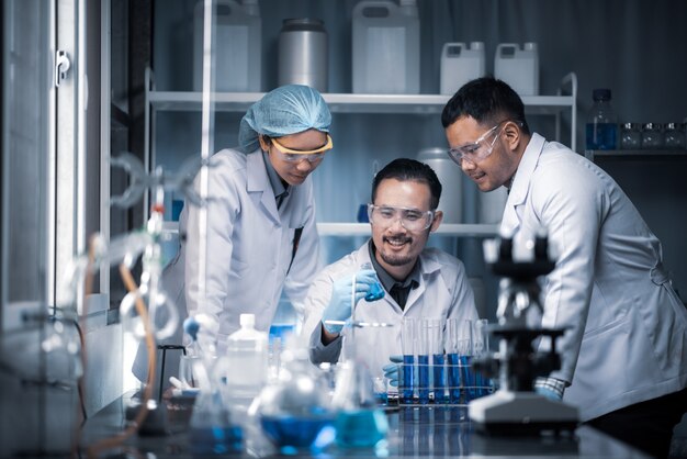 Health care researchers working in life science laboratory