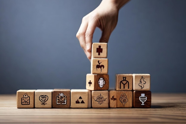 Health Insurance Concept Hand arranging wood cube stacking with icon healthcare medical