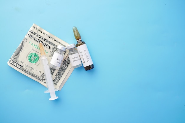 Healthcare cost concept with us dollar vaccine and pills